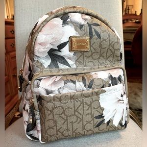 Calvin Klein Mini Backpack. NEVER USED! Two Zip-Up pockets, tons of space!